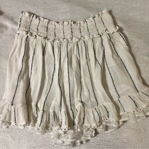 White and black striped skirt.